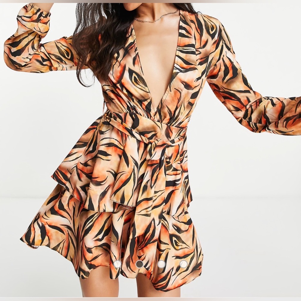 Zack London orange tiger print mini dress with tie waist and long sleeves.